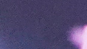 Confetti falls over Isela Santiago Morales during her 15th birthday party at a stadium in Axtla de Terrazas, Mexico, Saturday, Aug. 23, 2025, organized by the community after her father's social media appeal drew support following her first sparsely attended celebration. (AP Photo/Mauricio Palos)