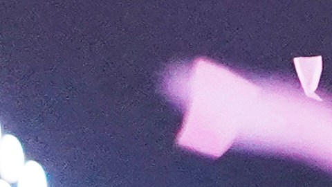 Confetti falls over Isela Santiago Morales during her 15th birthday party at a stadium in Axtla de Terrazas, Mexico, Saturday, Aug. 23, 2025, organized by the community after her father's social media appeal drew support following her first sparsely attended celebration. (AP Photo/Mauricio Palos)