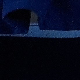 Acting U.S. Attorney Bill Essayli, middle, gestures while speaking during a news conference announcing an arrest made in the Palisades Fire, Wednesday, Oct. 8, 2025, in Los Angeles. (AP Photo/Damian Dovarganes)