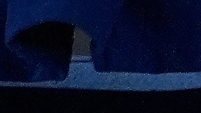 Acting U.S. Attorney Bill Essayli, middle, gestures while speaking during a news conference announcing an arrest made in the Palisades Fire, Wednesday, Oct. 8, 2025, in Los Angeles. (AP Photo/Damian Dovarganes)