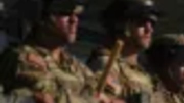 California National Guard are positioned at the Federal Building on Tuesday, June 10, 2025, in downtown Los Angeles. (AP Photo/Eric Thayer)