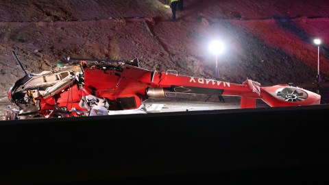 A medical helicopter is shown after it crashed on Highway 50 Monday, Oct. 6, 2025, in Sacramento, Calif. (AP Photo/Scott Marshall)