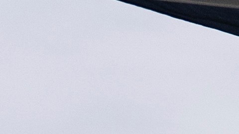 A table covered with a cloth reading "ICE Out of LA" sits under a canopy next to the job center for day laborers outside a Home Depot in the Van Nuys section of Los Angeles, Aug. 28, 2025. (AP Photo/Jae C. Hong)