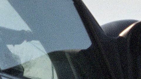 California Highway Patrol officer Rob Lund gives Virginia Luk of Temple City, Calif., a warning for exceeding the speed limit on Interstate 210 in Altadena, California on Sunday, Dec. 17, 1995. Lund says that the CHP will be strictly enforcing the new speed limits. (AP Photo/Mark J. Terrill)