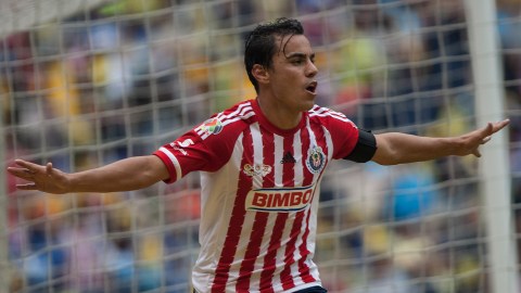Chivas´ Omar Bravo celebrates after scoring against America during a Mexican soccer league match in Mexico City, Saturday, Sept. 26, 2015. (AP Photo/Christian Palma)