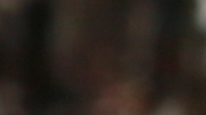 In this Wednesday, Oct. 11, 2017 photo, Mickey Thompson puts coins into a parking meter in Oklahoma City. The city where parking meters were born says it’s doing away with the last of its ancient, coin-operated models by the end of the year to make way for newer ones.  Technology inside Oklahoma City’s old-school meters dated to the 1960s and 1970s, and many companies that once serviced them have long been out of business. (AP Photo/Sue Ogrocki)