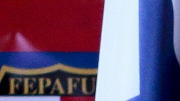 FILE - Panamanian Soccer Federation President Manuel Arias, left, stands with new coach Americo Gallego, during Gallego's media presentation, in Panama City, Aug. 6, 2019. (AP Photo/Eric Batista, File)