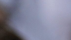 Former soccer player Andres Iniesta lifts the trophy during the opening of the official UEFA fan festival in Munich, Germany, Thursday, May 29, 2025, ahead of the Champions League final soccer match between Inter and PSG. (AP Photo/Matthias Schrader)