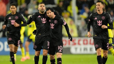 Inter Miami forward Lionel Messi (10) is congratulated by defender Jordi Alba (18) after his goal during the second half of Game 2 in the first round of MLS soccer Eastern Conference playoff against Nashville SC, Saturday, Nov. 1, 2025, in Nashville, Tenn. (AP Photo/George Walker IV)
