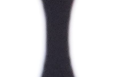 FILE - Jake Paul, front, reacts for photographers during a ceremonial weigh-in ahead of his cruiserweight boxing match against Julio Cesar Chavez Jr., Friday, June 27, 2025, in Anaheim, Calif. (AP Photo/Chris Pizzello, File)