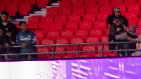 Congo national team members pose for a photo as they celebrate with their coach Sebastien Desabre after being qualified for the FIFA 2026 soccer World Cup in the African qualifier final match against Nigeria, in Rabat, Morocco, Sunday, Nov. 16, 2025. (AP Photo)