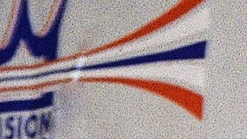 Boxing promoter Don King, center, holds the wrists of Meldrick Taylor from Philadelphia, two-time world super lightweight champion, left, and World Boxing Council super lightweight champion Julio Cesar Chavez of Mexico during a news conference on Tuesday, July 19, 1994 in Los Angeles to announce a rematch between the boxers in Las Vegas on September 17. (AP Photo/Nick Ut)