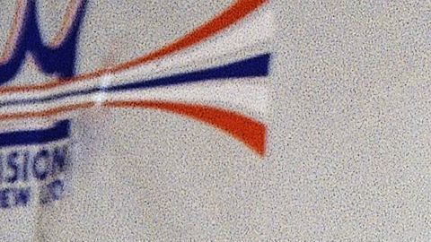 Boxing promoter Don King, center, holds the wrists of Meldrick Taylor from Philadelphia, two-time world super lightweight champion, left, and World Boxing Council super lightweight champion Julio Cesar Chavez of Mexico during a news conference on Tuesday, July 19, 1994 in Los Angeles to announce a rematch between the boxers in Las Vegas on September 17. (AP Photo/Nick Ut)