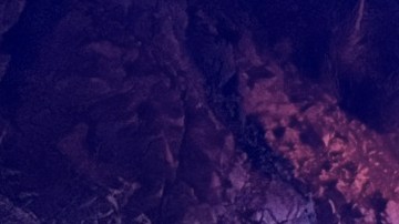 This image provided by San Bernardino County Fire shows the scene on a highway near Running Springs, Calif., where a bus overturned on Sunday, Nov. 9, 2025. (San Bernadino County Fire via AP