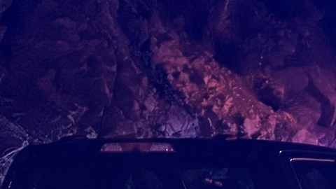 This image provided by San Bernardino County Fire shows the scene on a highway near Running Springs, Calif., where a bus overturned on Sunday, Nov. 9, 2025. (San Bernadino County Fire via AP