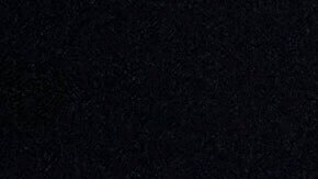 A U.S. Immigration and Customs Enforcement agent takes part in an early morning operation in Park Ridge, Ill., Sept. 19, 2025. (AP Photo/Erin Hooley, File)