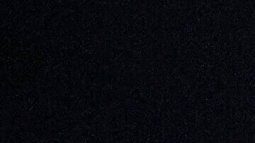 A U.S. Immigration and Customs Enforcement agent takes part in an early morning operation in Park Ridge, Ill., Sept. 19, 2025. (AP Photo/Erin Hooley, File)