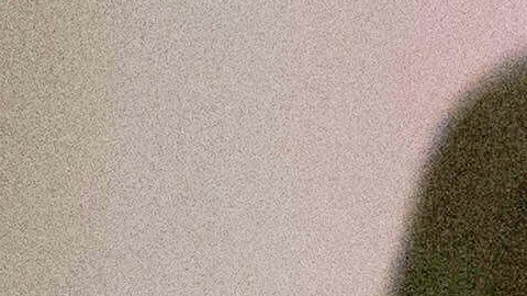 FILE - A federal agent wears an Immigration and Customs Enforcement badge at the immigration court at Jacob K. Javits Federal Building in New York, on Monday, June 9, 2025. (AP Photo/Yuki Iwamura, File)