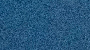 A beachgoer standing on a sand berm watches high surf near Manhattan Beach, Calif. on Thursday, Dec. 28, 2023. The National Weather Service has issued high surf warnings for much of the West Coast and parts of Hawaii, describing the waves and rip currents expected to hit certain coastlines as potentially dangerous and life-threatening.(AP Photo/Richard Vogel)