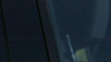 A symbol of mourning for slain California Highway Patrol Officer Thomas J. Steiner is placed over the CHP insignia on a patrol car door at the station where Steiner worked in Santa Fe Springs, Calif. Valentino Mitchell Arenas, 16, was charged Friday, April 23, 2004, with murdering Steiner in what authorities called a "random assassination" linked to street gang activity. (AP Photo/Kevork Djansezian)