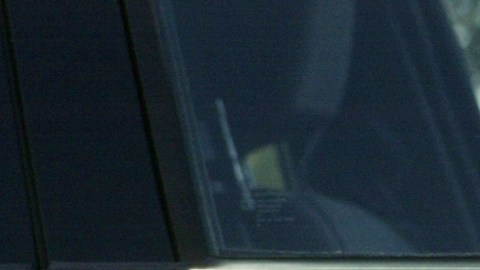 A symbol of mourning for slain California Highway Patrol Officer Thomas J. Steiner is placed over the CHP insignia on a patrol car door at the station where Steiner worked in Santa Fe Springs, Calif. Valentino Mitchell Arenas, 16, was charged Friday, April 23, 2004, with murdering Steiner in what authorities called a "random assassination" linked to street gang activity. (AP Photo/Kevork Djansezian)