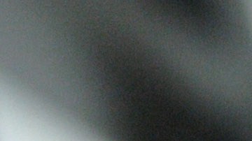 A man, detained for illegal border crossing, holds a bar in the detention center of the Hungarian Border Guard in Nyirbator, Hungary, near the Ukrainian border (260 km east of Budapest) April 12, 2007. ungary is prepared to reinforce its non-EU borders and will join the Schengen Agreement and its Information System (SIS), a central database, at the beginning of 2008. The Schengen system is an agreement among European states which allows the abolition of systematic border controls between the participating countries while they guard the external borders heavily. (AP Photo/Bela Szandelszky)