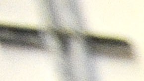 FILE - In this Nov. 14, 2013 file photo, a corrections officer stands near a gate at Baltimore City Detention Center in Baltimore. Inside the Baltimore City Detention Center, gang members used smuggled cellphones, dealt drugs and had sex with corrupt guards  several of whom they impregnated  who helped them as they ran operations of the Black Guerilla Family, according to court papers in a case alleging widespread corruption at the state-run facility. (AP Photo/Steve Ruark, FIle)