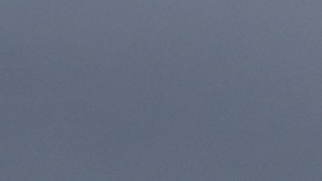 Heavy clouds are seen over the Los Angeles City Hall building, Monday, Nov. 17, 2025, in Los Angeles. (AP Photo/Damian Dovarganes)