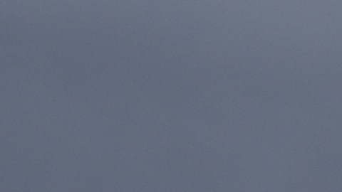 Heavy clouds are seen over the Los Angeles City Hall building, Monday, Nov. 17, 2025, in Los Angeles. (AP Photo/Damian Dovarganes)