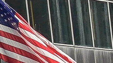 Los Angeles Dodgers players, coaches and ownership group are paraded on buses during the baseball team's World Series championship parade Friday, Nov. 1, 2024, in Los Angeles. (AP Photo/Damian Dovarganes)