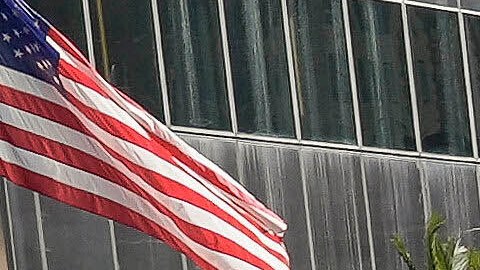 Los Angeles Dodgers players, coaches and ownership group are paraded on buses during the baseball team's World Series championship parade Friday, Nov. 1, 2024, in Los Angeles. (AP Photo/Damian Dovarganes)