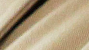 FILE - This March 26, 2014 file photo shows a shield on the uniform of a California Highway Patrol officer at the state Capitol in Sacramento, Calif. The California Highway Patrol has suspended the police powers of numerous officers and supervisors in the agency's East Los Angeles office after discovering fraudulent overtime records. Chief Mark Garrett of the agency's Southern Division said at a news conference Friday, Feb. 1, 2019, that an investigation has uncovered at least $360,000 in fraudulent overtime pay in 2017 and 2018. (AP Photo/Rich Pedroncelli, File)