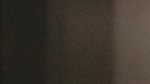 In this Wednesday, Aug. 28, 2019, photo shows a detainee waiting to be processed at the Adelanto ICE Processing Center in Adelanto, Calif. The facility is a privately operated immigration detention center run by the GEO Group, which can house up to about 1900 total immigrant detainees, both male and female. (AP Photo/Chris Carlson)