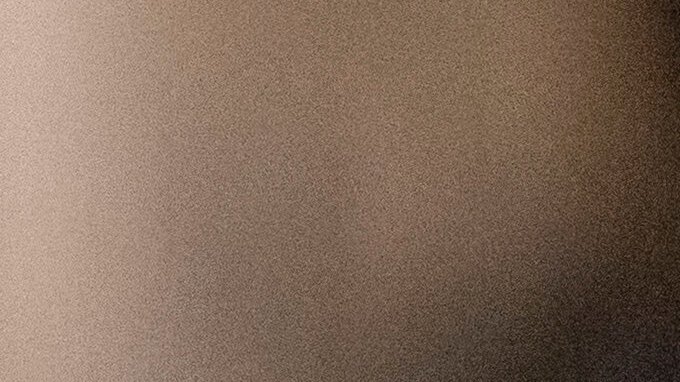 A federal agent wears a badge of Immigration and Customs Enforcement at the immigration court at Jacob K. Javits Federal Building in New York, Monday, June 9, 2025. (AP Photo/Yuki Iwamura)