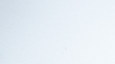 James Jones places a sandbag to prevent water from running off a property scorched in the Eaton Fire in Altadena, Calif., as the region remains under flash flood warnings on Saturday, Nov. 15, 2025. (AP Photo/Noah Berger)