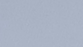 An image of former Canadian Olympic snowboarder Ryan Wedding, 43, who is a fugitive and been charged with allegedly running and participating in a transnational drug trafficking operation, is displayed on a video monitor along with bricks of cocaine, foreground, during a news conference at the FBI offices in Los Angeles, Thursday, Oct. 17, 2024. (AP Photo/Damian Dovarganes)