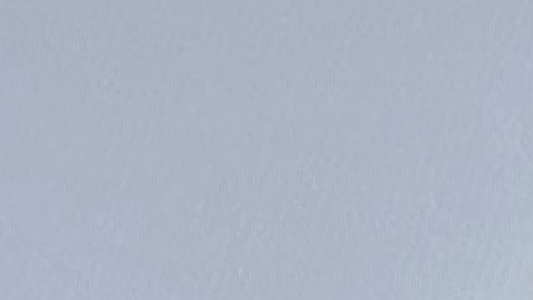 An image of former Canadian Olympic snowboarder Ryan Wedding, 43, who is a fugitive and been charged with allegedly running and participating in a transnational drug trafficking operation, is displayed on a video monitor along with bricks of cocaine, foreground, during a news conference at the FBI offices in Los Angeles, Thursday, Oct. 17, 2024. (AP Photo/Damian Dovarganes)