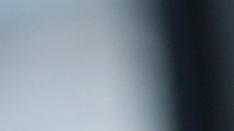 A handcuffed suspect waits inside a police bus during an operation against alleged drug traffickers at the Complexo do Alemao slum in Rio de Janeiro, Brazil, Saturday, Nov. 27, 2010. Soldiers and police crouching behind armored vehicles trained their rifles on dozens of entrances to a sprawling slum Saturday, preparing to invade and try to push drug gangs out an area long considered the most dangerous in Rio de Janeiro, a city set to host the 2016 Olympics. (AP Photo/Felipe Dana)