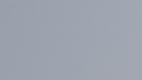 Visitors walk in the rain at the Griffith Park Observatory during a storm on Tuesday, Oct. 14, 2025, in Los Angeles. (AP Photo/Damian Dovarganes)