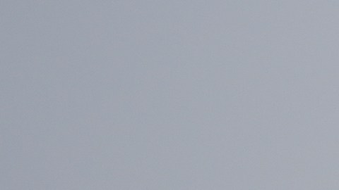 Visitors walk in the rain at the Griffith Park Observatory during a storm on Tuesday, Oct. 14, 2025, in Los Angeles. (AP Photo/Damian Dovarganes)