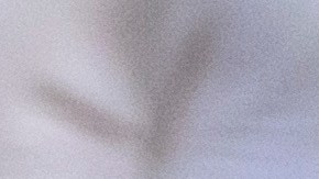 Kansas City Chiefs quarterback Patrick Mahomes grabs his knee after being injured during the second half of an NFL football game against the Los Angeles Chargers, Sunday, Dec. 14, 2025 in Kansas City, Mo. (AP Photo/Reed Hoffmann)