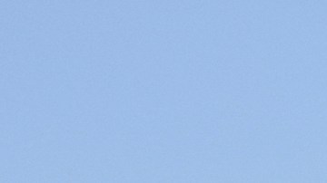 Immigration agents conduct an operation at a car wash on Friday, Aug. 15, 2025, in Montebello, Calif. (AP Photo/Gregory Bull)