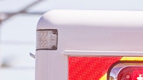 An unidentified Los Angeles firefighter is checked inside an ambulance after containing a fire at the Animo South Los Angeles Charter High School in Los Angeles, Tuesday, July 22, 2014. The building was presumed empty, although crews had been doing routine maintenance work over the summer break to ready it for the school year that begins Aug. 12, according to Gabriel Sanchez, a spokesman for Green Dot schools, which runs the charter school under Los Angeles Unified School District control. Three firefighters suffered minor injuries, but all were treated at the scene. (AP Photo)