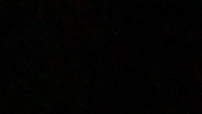 A car sits buried in mud after flooding Wednesday, Dec. 24, 2025, in Wrightwood, Calif. (AP Photo/Wally Skalij)