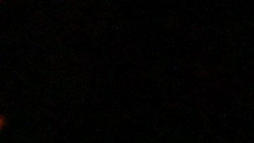 A car sits buried in mud after flooding Wednesday, Dec. 24, 2025, in Wrightwood, Calif. (AP Photo/Wally Skalij)