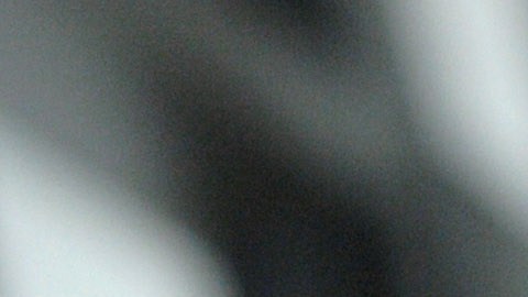 A man, detained for illegal border crossing, holds a bar in the detention center of the Hungarian Border Guard in Nyirbator, Hungary, near the Ukrainian border (260 km east of Budapest) April 12, 2007. ungary is prepared to reinforce its non-EU borders and will join the Schengen Agreement and its Information System (SIS), a central database, at the beginning of 2008. The Schengen system is an agreement among European states which allows the abolition of systematic border controls between the participating countries while they guard the external borders heavily. (AP Photo/Bela Szandelszky)