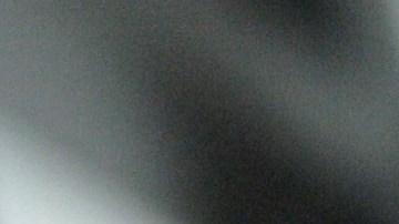 A man, detained for illegal border crossing, holds a bar in the detention center of the Hungarian Border Guard in Nyirbator, Hungary, near the Ukrainian border (260 km east of Budapest) April 12, 2007. ungary is prepared to reinforce its non-EU borders and will join the Schengen Agreement and its Information System (SIS), a central database, at the beginning of 2008. The Schengen system is an agreement among European states which allows the abolition of systematic border controls between the participating countries while they guard the external borders heavily. (AP Photo/Bela Szandelszky)