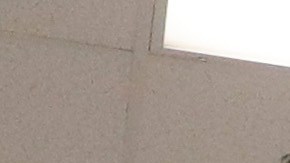 In this Wednesday, Aug. 28, 2019, photo shows a guard walks a with a detainee in the intake area at the Adelanto ICE Processing Center in Adelanto, Calif. The facility is a privately operated immigration detention center run by the GEO Group, which can house up to about 1900 total immigrant detainees, both male and female. (AP Photo/Chris Carlson)