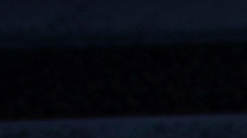 Pedestrians cast a shadow across an intersection crosswalk in Tokyo Wednesday, Feb. 3, 2021. The Japanese capital confirmed more than 670 new coronavirus cases on Wednesday. (AP Photo/Eugene Hoshiko)