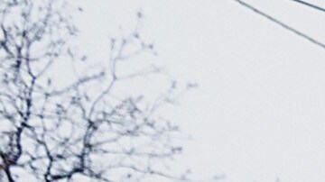 Steve Wogoman carries Christmas presents from his granddaughter's flooded home following heavy rains, on Monday, Dec. 22, 2025, in Redding, Calif. (AP Photo/Noah Berger)